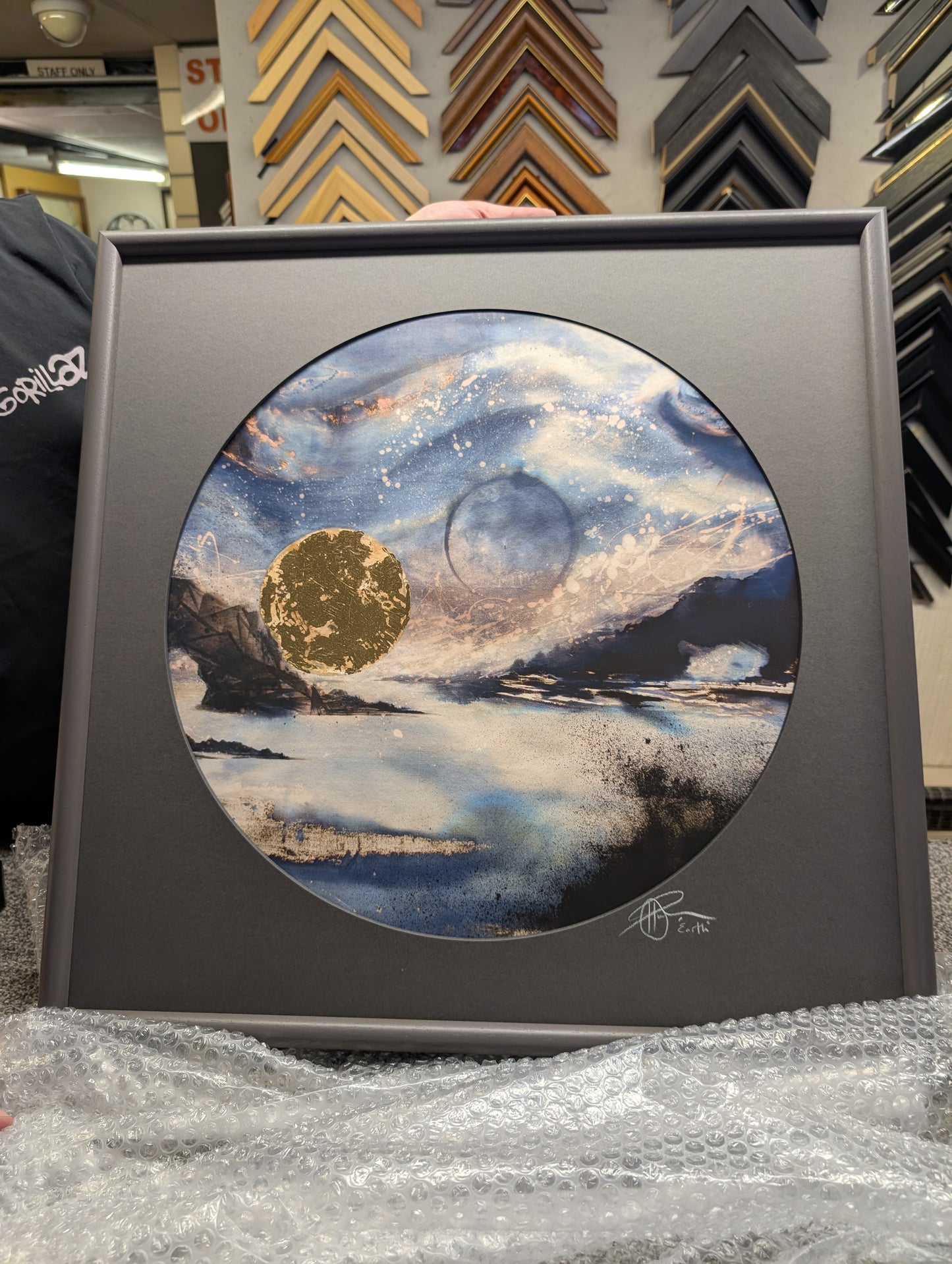 Earth | The sun sets behind an earthly rock formation jutting form the ocean under a kaleidoscopic celestial sky | Hand embellished Print | By Hannah Pugh